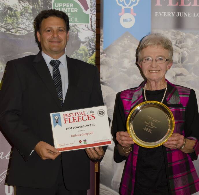 WINNER: Upper Hunter Shire Mayor Wayne Bedggood presents the Pam Powers Award for 2016 to Festival of the Fleeces committee member Barbara Campbell. Picture: Zanne Art Photography.