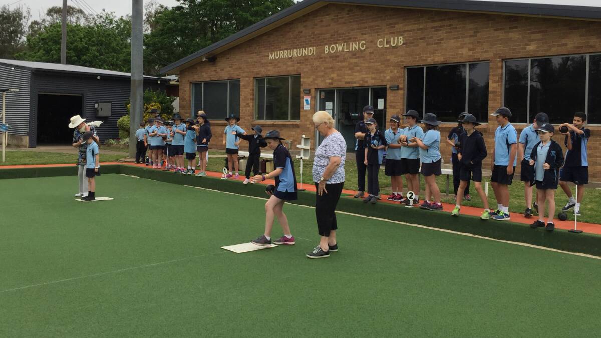 ROLL UP: Murrurundi Public School students on the bowling green for sport.