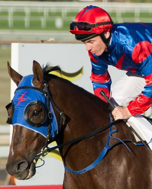 INSPIRATIONAL: Jockey Tim Clark guides Pajero to a thrilling victory - a blanket finish that involved 10 of the 16 runners - in the Emirates Park Scone Cup last Friday.