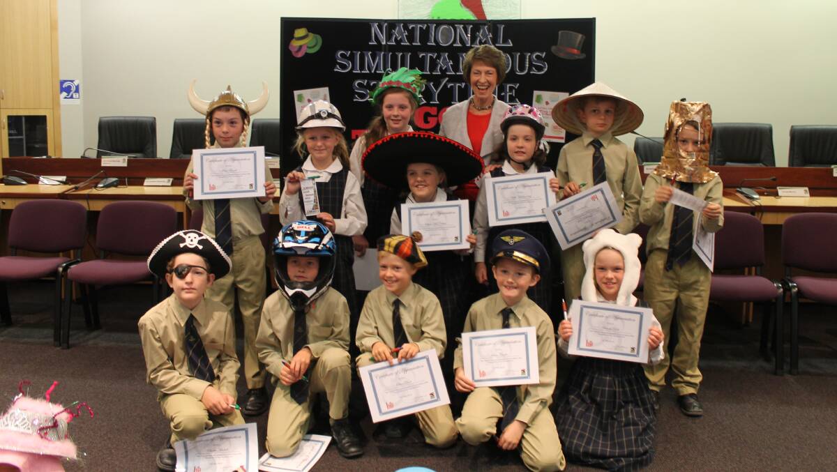 READ ABOUT IT: Patricia Molyneux and Year 3 students from the Scone Grammar School who read this year’s National Simultaneous Storytime book, I Got This Hat, in Scone.