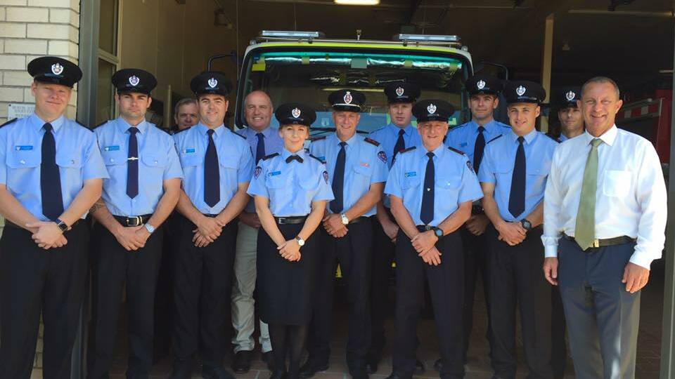GOOD NEWS: Upper Hunter MP Michael Johnsen with Minister for Emergency Services David Elliott and the members of the Branxton Fire Bridge Unit.