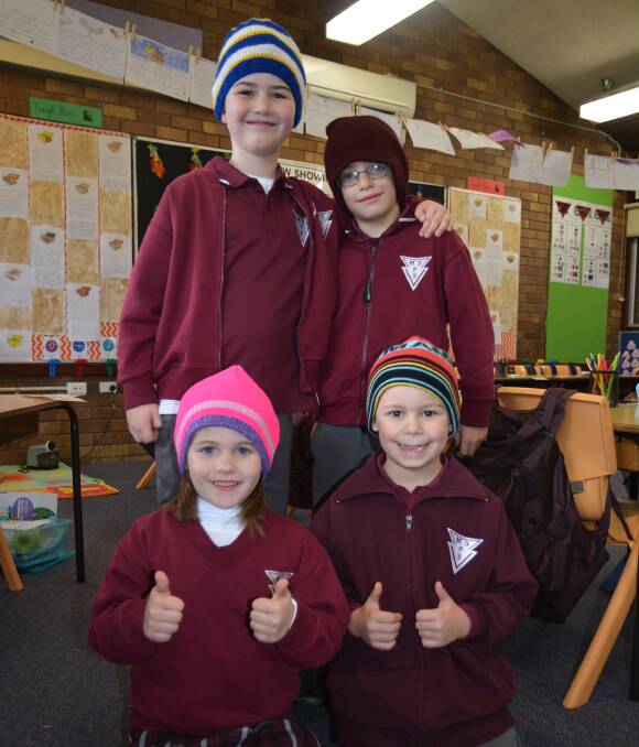 BEANIE BUDDIES: Muswellbrook South Public School Year 1 students (back) Riley Jeans, Kaori Smith, (front) Jorja Sharp and Brodie Schmarr, are helping raise funding and awareness for the cause.