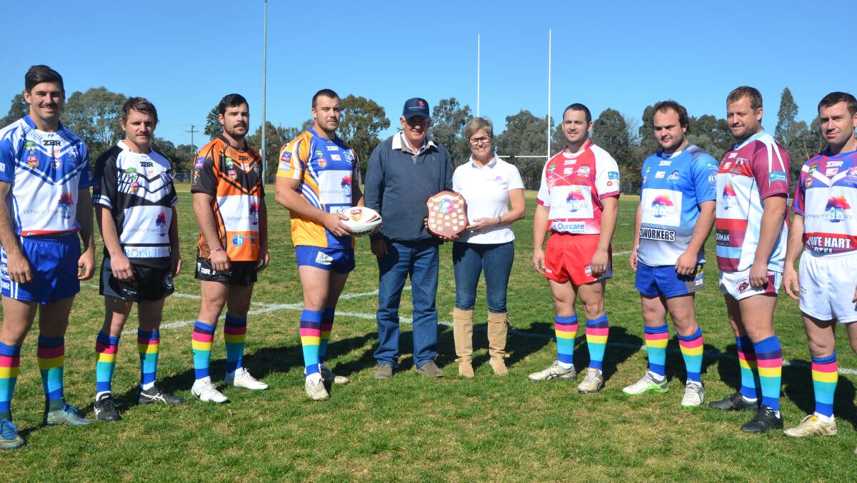 UNITED FRONT: Co-founders Hilton and Pauline Carrigan, with Tim Smith (Scone Thoroughbreds), Ben Robbins (Merriwa Magpies), Daniel Hoogerwerf (Aberdeen Tigers), Dylan Thorne (Muswellbrook Rams), Jye Bayley (Singleton Greyhounds), Josh Dicker (Greta Branxton Colts), Tom Hagan (Denman Devils) and Justin Whitehead (Murrurundi Mavericks), at the launch of the BHP Billiton Hunter Valley Group 21 Rugby League Where There’s A Will round on Monday.
