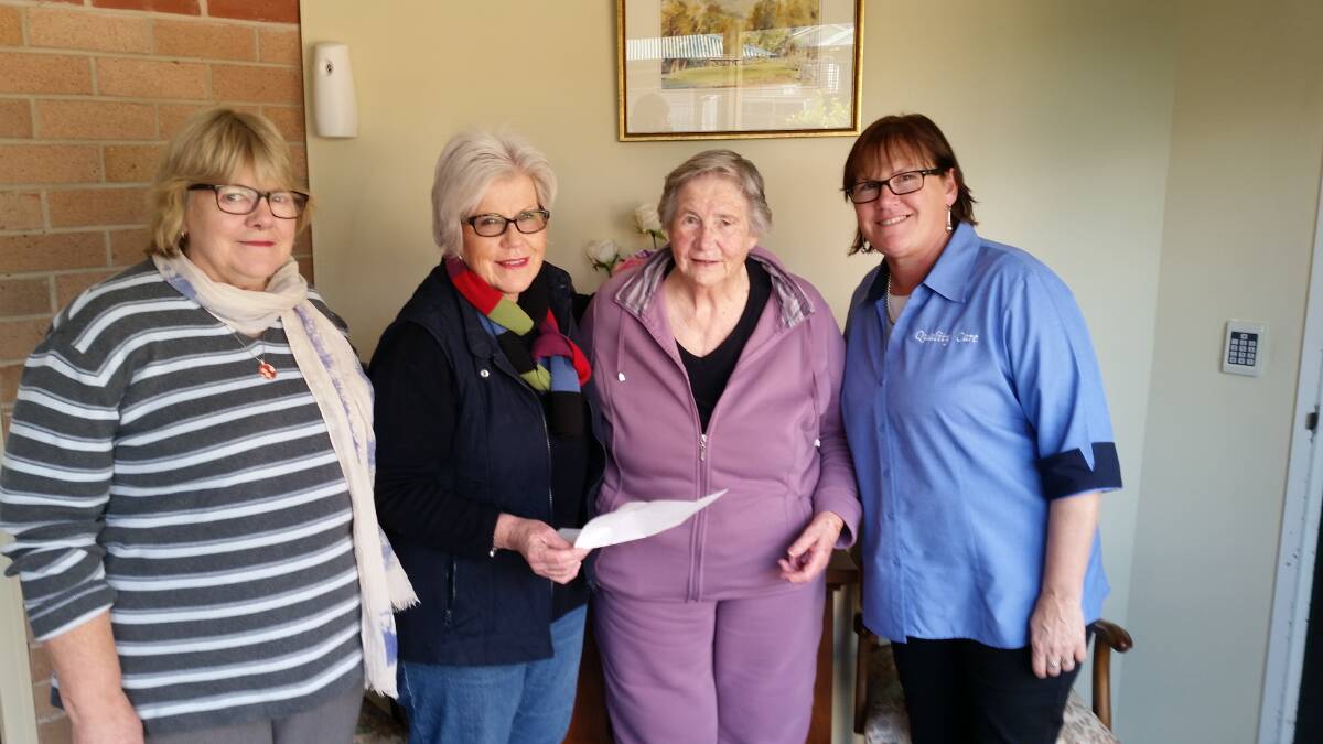 BIG THANKS: Shirley Yates (second from right) accepts the cheque from Jane Sullivan, as Jenny Walker and Di van Balen look on.