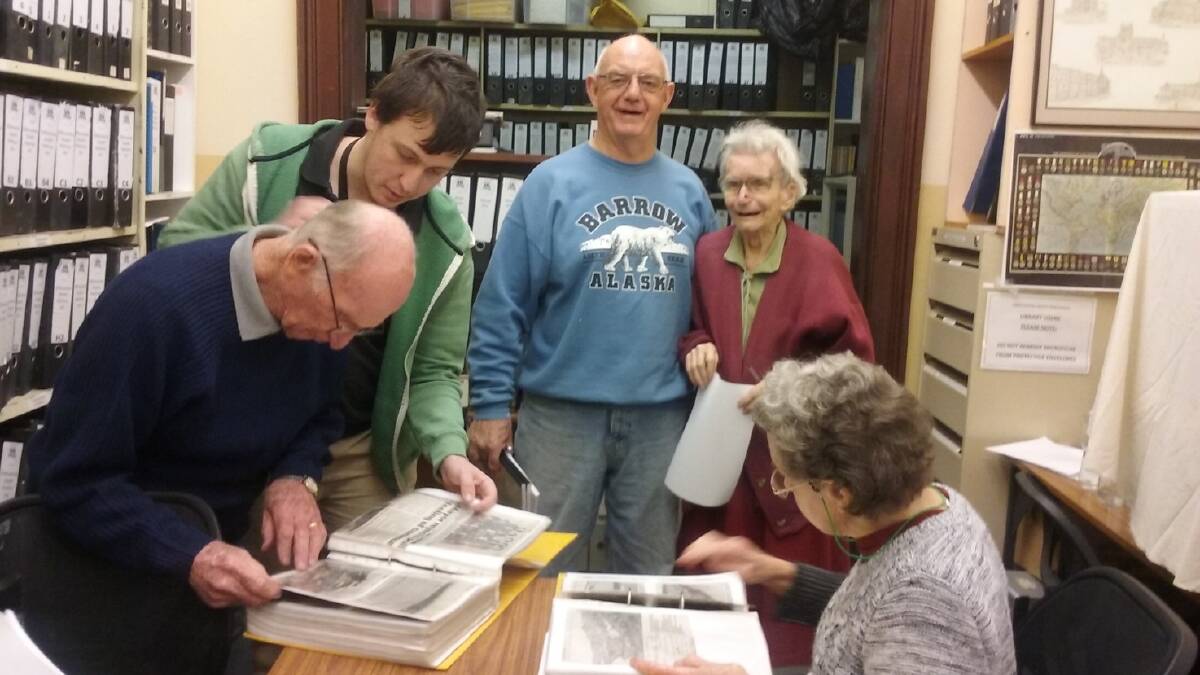 GREAT OPPORTUNITY: Jim Papworth, Eden Flaks, John Tindale, Dot Clayworth and Miriam Knight check some of the resources of the Family History Society Singleton library.
