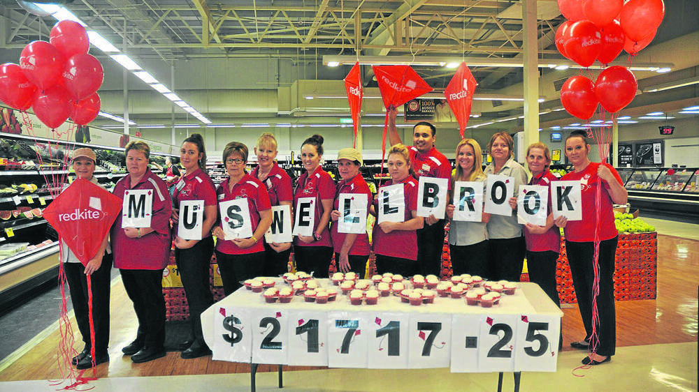 SUPPORTIVE: Staff from Coles at Muswellbrook backed the 2015 campaign.