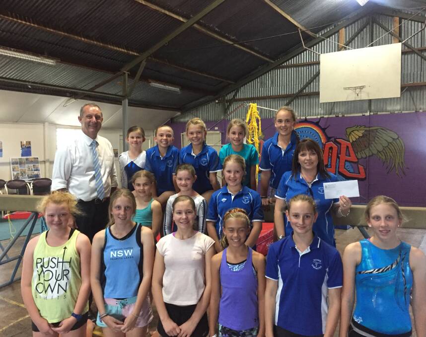 GRANTS AVAILABLE: Member for Upper Hunter, Michael Johnsen MP with the Scone Gymnastics Club.