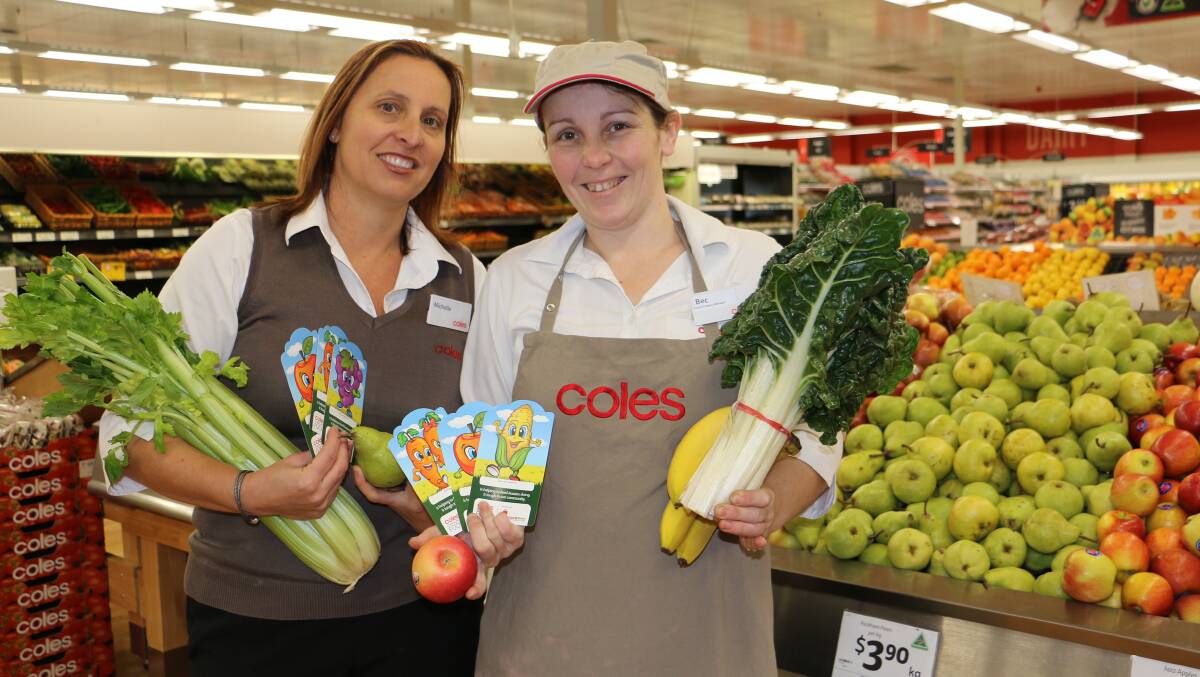 FOOD FOR ALL: Michelle Smith and Bec Campbell, the dry goods and fresh produce managers at Coles Tanilba Bay. Picture: Ellie-Marie Watts