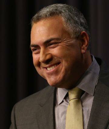 Treasurer Joe Hockey has called on households and business to use debt to fund new opportunities. Photo: Andrew Meares