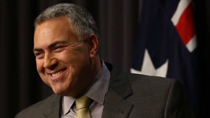 Treasurer Joe Hockey has called on households and business to use debt to fund new opportunities. Photo: Andrew Meares