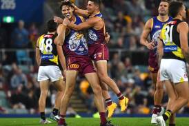 Eric Hipwood (L) has received a one-match ban out of Brisbane's thumping win over Richmond. (Jono Searle/AAP PHOTOS)