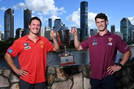 The Berry brothers Tom (left) and Jarrod will go head-to-head in Sunday's QClash at the Gabba. (Darren England/AAP PHOTOS)