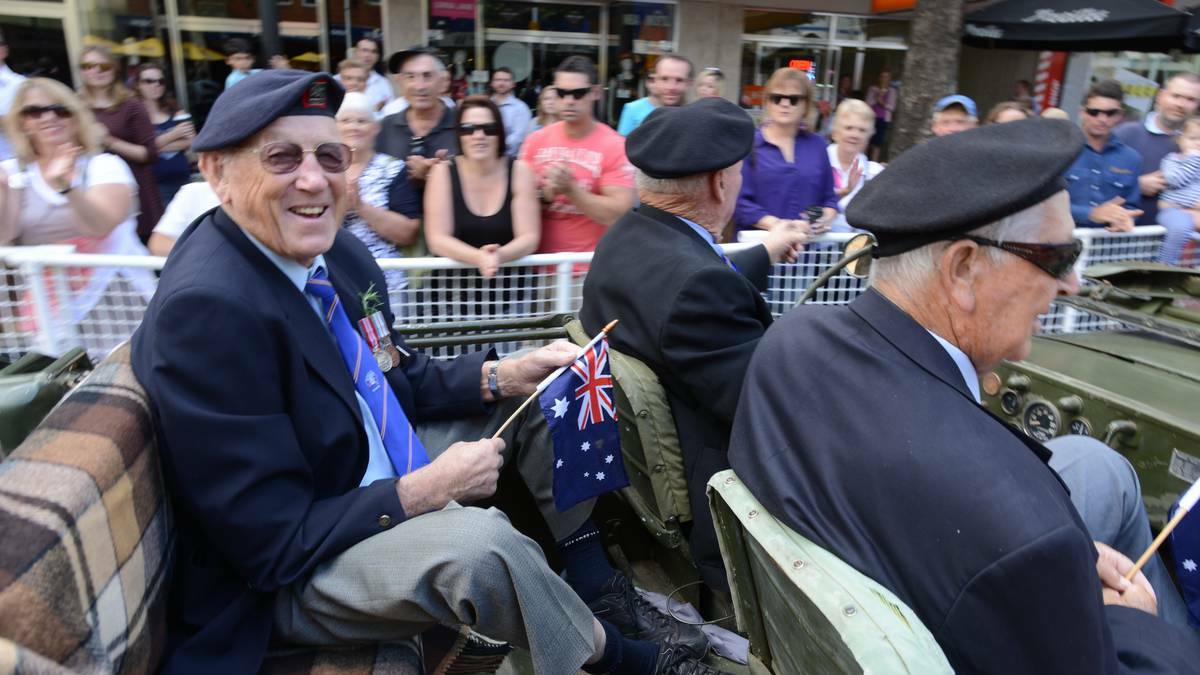 TAMWORTH: War veterans ride in the Anzac Day March. Photo: Barry Smith, The Northern Daily Leader. 