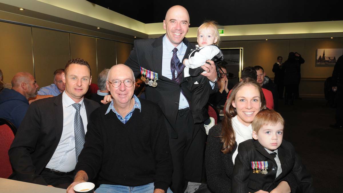 ORANGE: Brad Vodopia with Barry, Adam, Archie, Stacey and Charlie Tudor at the Anzac Day breakfast. Photo: Steve Gosch, Central Western Daily. 