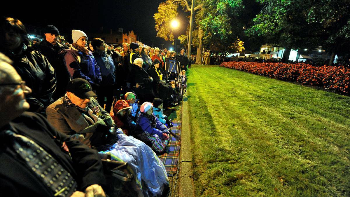 BALLARAT: Thousands watch on at the Cenotaph on morning. Photo: Jeremy Bannister, The Courier. 