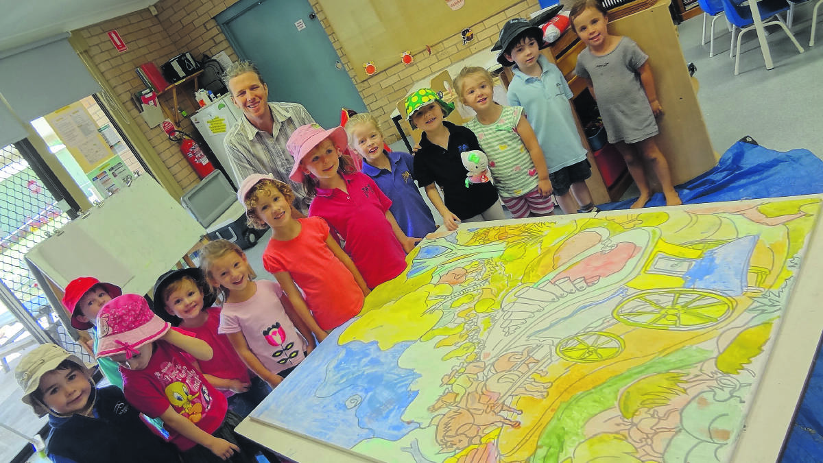 ARTISTIC TOUCH: Children from Scone Pre-School with artist Andrew Davis at the Main St Mural community art project. 
