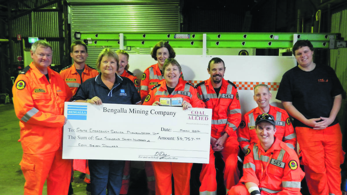 INVALUABLE SERVICE: From left, SES members Mark Elsley, Ben Maxwell, Bengalla’s Debbie Day and SES members Kaliya Maxwell, Mary Eager, Janelle Risby, Chris Smith, Steve Eager, John Ward and Jeff Irwin.