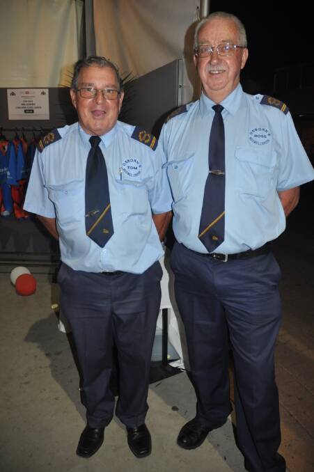 A fleet of buses brought the crowd to the fundraiser. Two of the drivers, Tom Galvin (left) and Ross Anlezark, enjoyed themselves despite being “designated drivers”