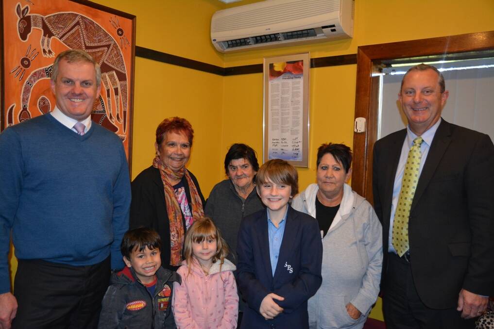SUPPORT: Muswellbrook Shire Council general manager Steve McDonald, Jean Hands, Gay Horton, Margaret Matthews, Upper Hunter MP Michael Johnsen.  Front (from left) Conan Bungie, Miley MacDonald and Noah Peterson at the Wanaruah Aboriginal Land Council flag raising ceremony on Monday.