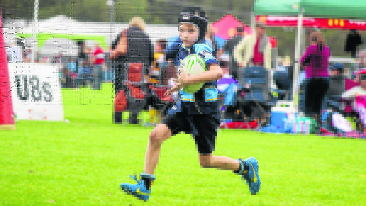 ON THE BURST: Archie Adkins in action for the Scone Junior Rugby under-8s at the Inverell Gala day on the weekend. 