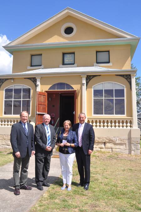 COMPLETED: SCADS president Scott White, Hunter Mutual area manager Sid Collison, SCADS vice president Anne Frame, and Upper Hunter Shire mayor Michael Johnsen outside the newly 
renovated Old Courthouse on Friday.
