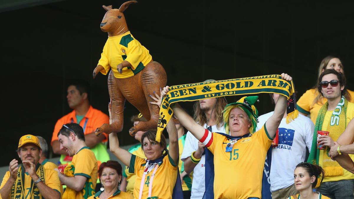 Fans cheered Australia against Chile at Arena Pantanal on June 13, while Warrnambool fans watched from The Cally. Photo: Getty Images)