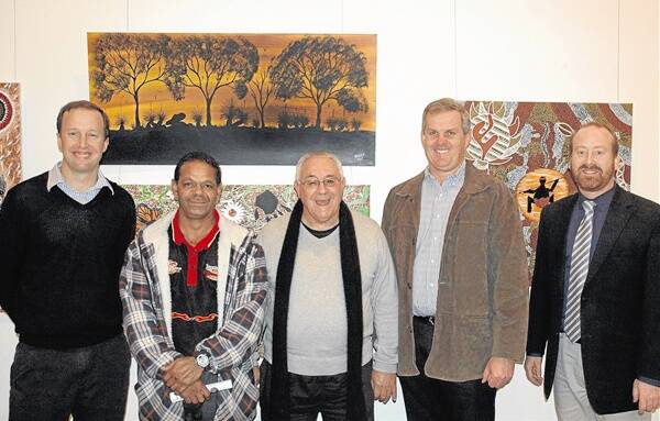 SHOWING SUPPORT: Coal and Allied representative James Davison, local artist Glenn Dennis, NAIDOC art awards adjudicator Les Elvin, Muswellbrook Shire Council's general manager Steve McDonald and mayor Martin Rush at the opening night of the art awards earlier this month. 