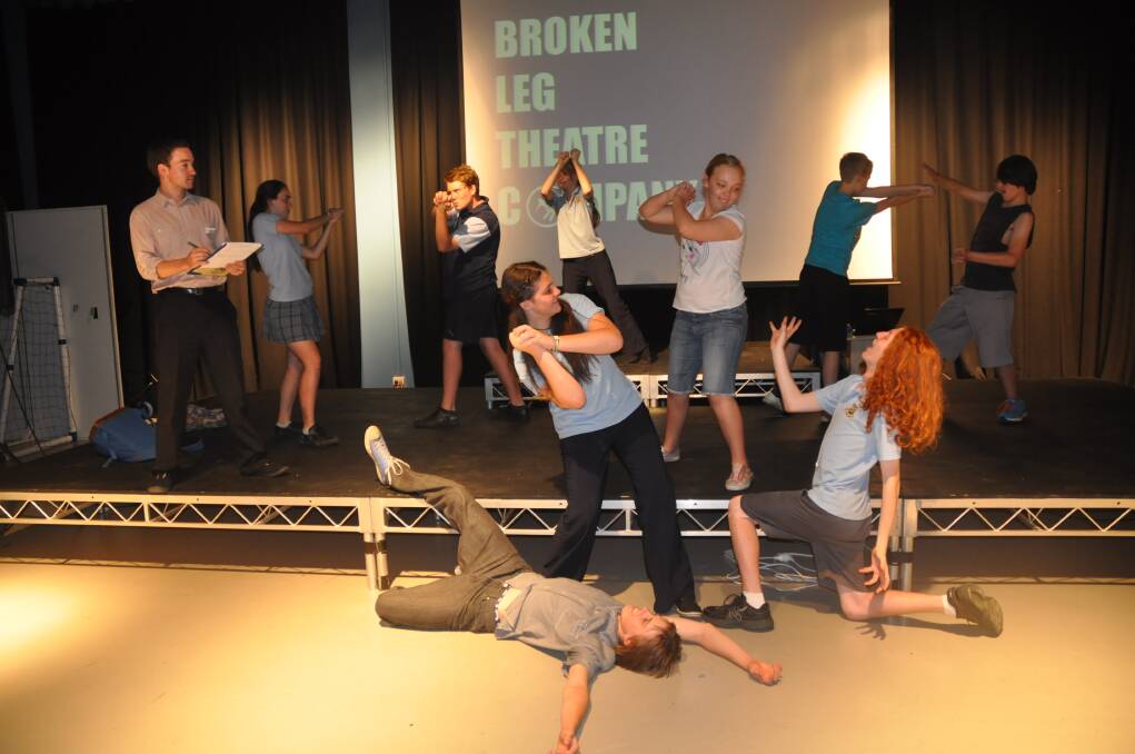 DECEMBER: THE WORLD’S A STAGE:Drama instructor Dan Stranger (left) leads Broken Leg students in drama exercise at Singleton Youth Venue.