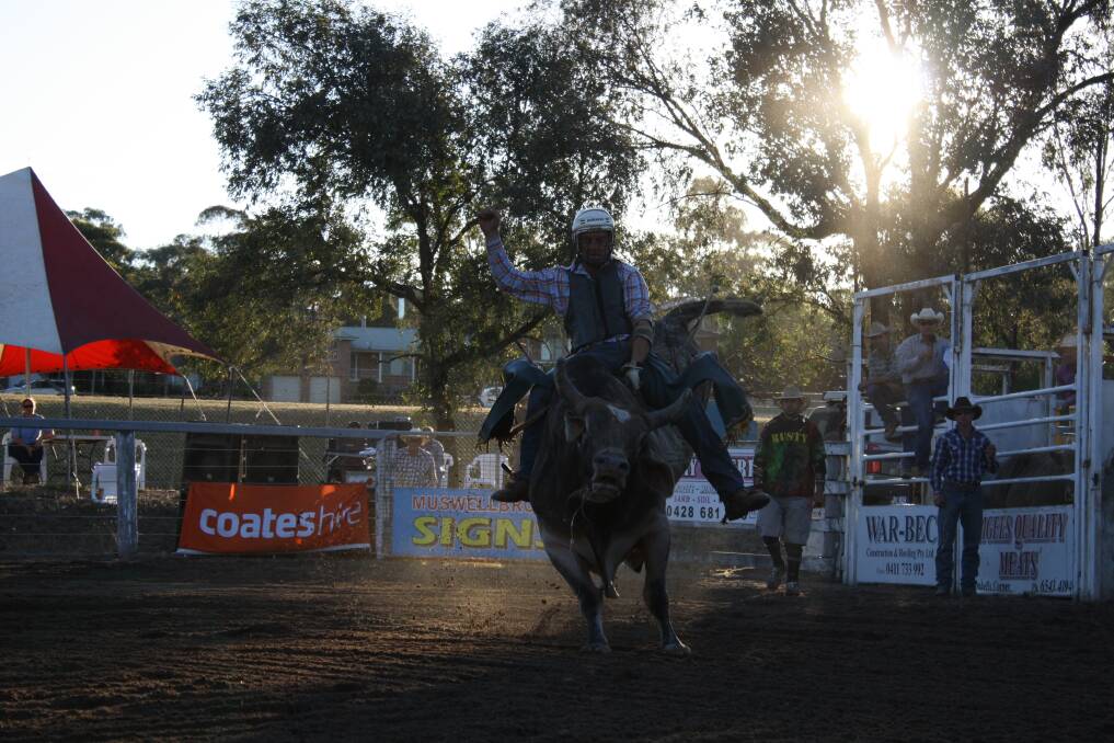 BUCKING WITH THE BEST: Rider Carl Green in action at last year’s Muswellbrook Charity Rodeo at the Muswellbrook Showground.  Pic: JEMMA ANSHAW