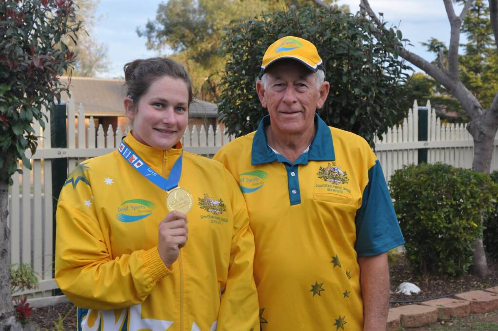 AUGUST: SOLID GOLD EFFORT: Talented athlete Amy-Lea Mills was delighted to bring home Australia’s only gold medal from the recent Deaflymics, as was her proud grandfather and coach George McCready.
