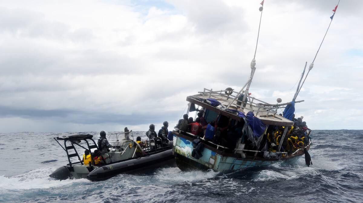 The boarding party of HMAS Albany intercept a Suspected Irregular Entry Vessel (SIEV) in the vicinity of Christmas Island during Operation RESOLUTE in 2013. Picture Department of Defence
