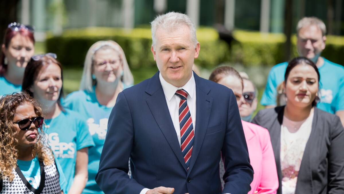 Workplace Relations Minister Tony Burke was applauded by early childhood educators at Parliament House after the industrial relations bill passed the lower house on Thursday. Picture by Sitthixay Ditthavong