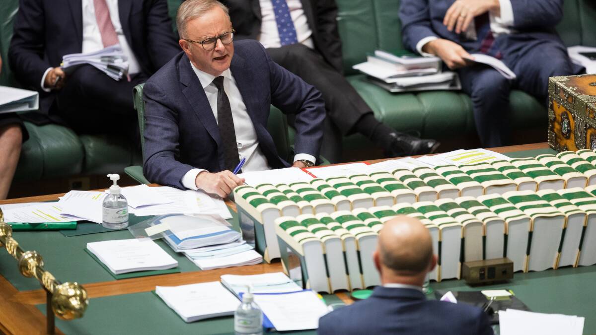 Prime Minister Anthony Albanese speaks to Opposition Leader Peter Dutton during question time on Tuesday. Picture by Sitthixay Ditthavong