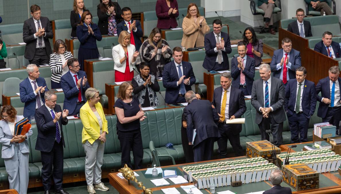 Prime Minister Anthony Albanese is congratulated after he spoke on the Voice in the House of Representatives. Picture by Gary Ramage