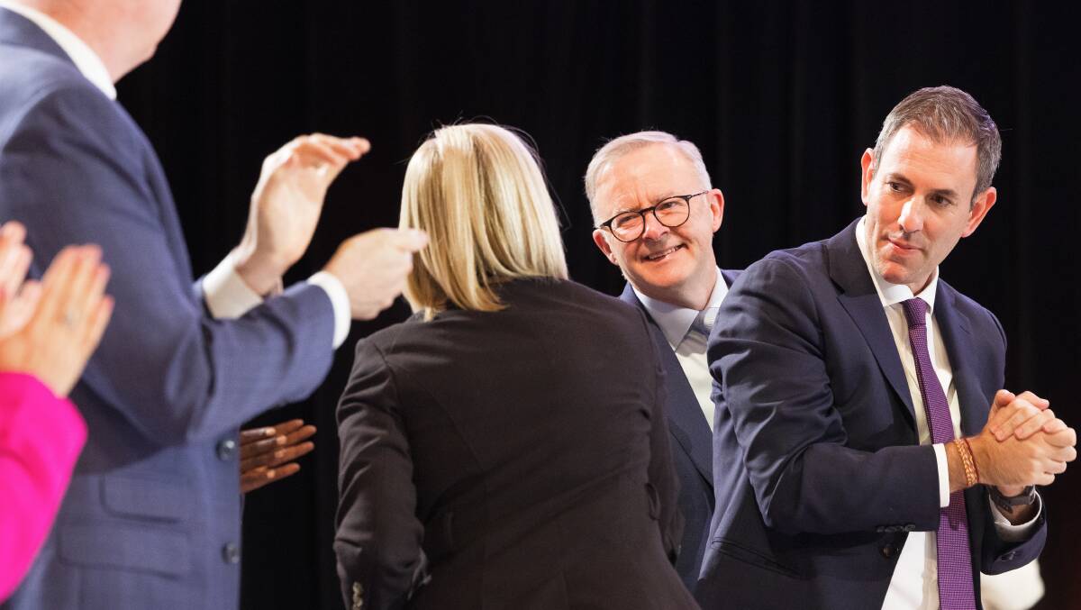 Prime Minister Anthony Albanese is congratulated after delivering closing remarks at the jobs and skills summit on Friday. Picture by Sitthixay Ditthavong