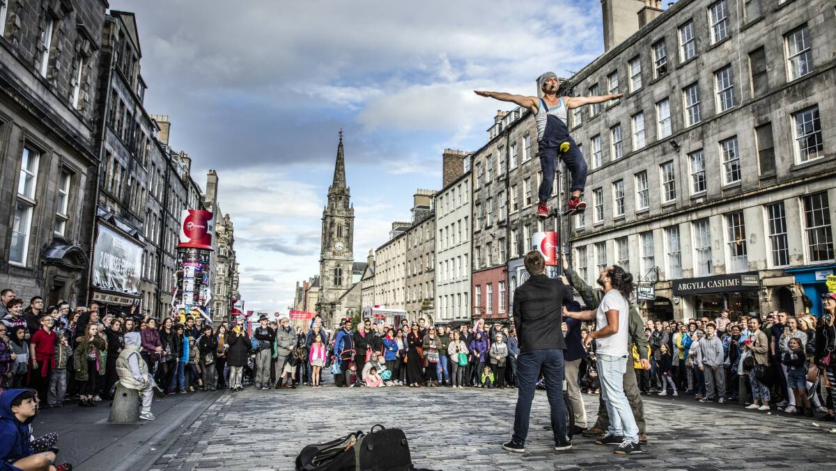 A street entertainer at the Edinburgh Tattoo. Picture: Visit Britain/Andrew Pickett.