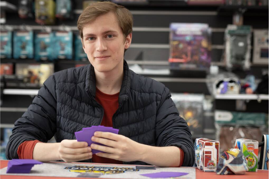 World champion Pokémon player Henry Brand visited Warrnambool's R.N.G. Tabletop Gaming on Sunday, putting local players through their paces. Picture by Sean McKenna