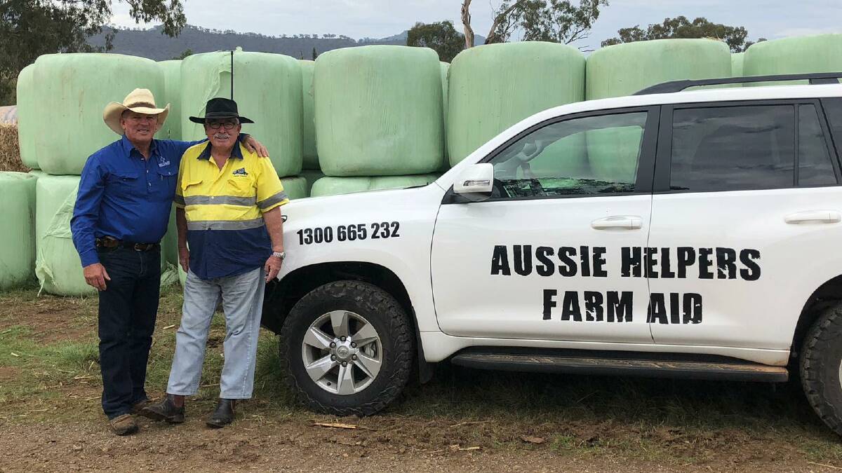 AUSSIE HELPERS: Belltrees farmer Anto White (L) with Brian Egan, the founder of Aussie Helpers. Picture: Supplied