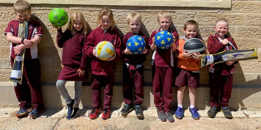SPORT: Students a Jerrys Plain Public School posing with their new sports equipment donated by Malabar Resources. Supplied: Malabar Resources