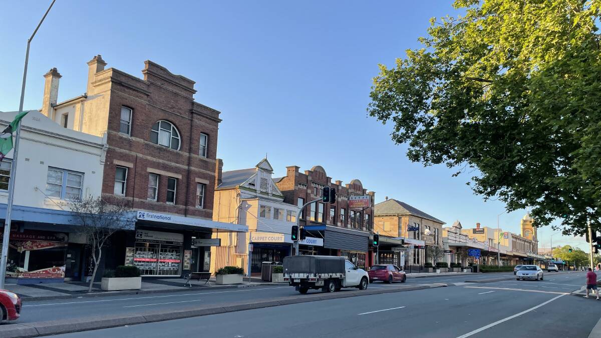 BUY LOCAL: The 'We Live Here' gift cards will be provided to AGL staff to spend in businesses across the Muswellbrook, Singleton and the wider Hunter region. Photo: Mathew Perry 