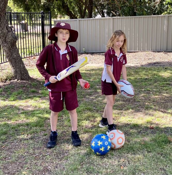 EQUIPMENT: All 32 students at Jerrys Plains Public School were given a choice of basketballs, netballs, footballs and tennis and cricket sets to help them stay active at home. Supplied: Malabar Resources