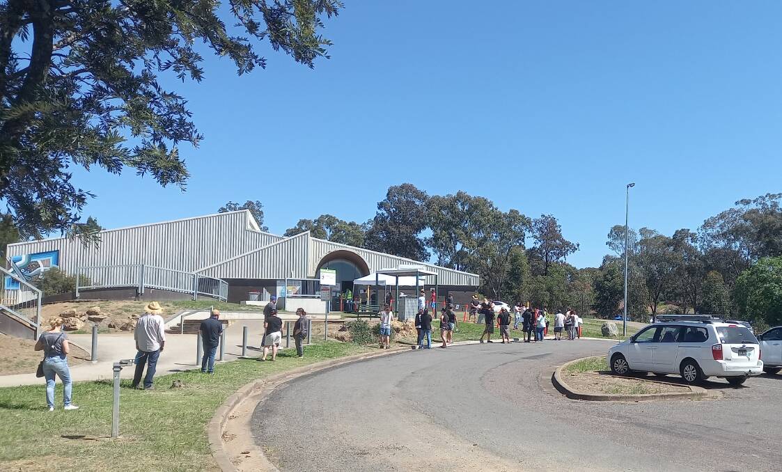 TURN OUT: Muswellbrook residents line up to receive a COVID-19 vaccination at Muswellbrook Indoor Sports Centre on Saturday, September 11. Picture: Mathew Perry