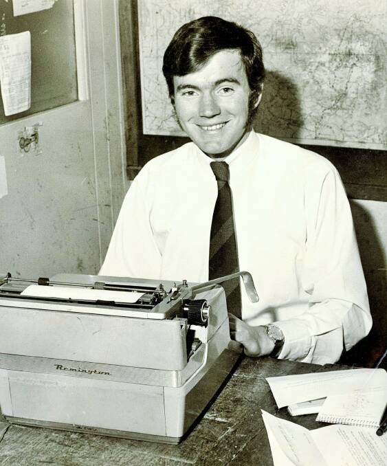 David Jones bashing out a story on the old manual typewriter in police rounds. Picture supplied