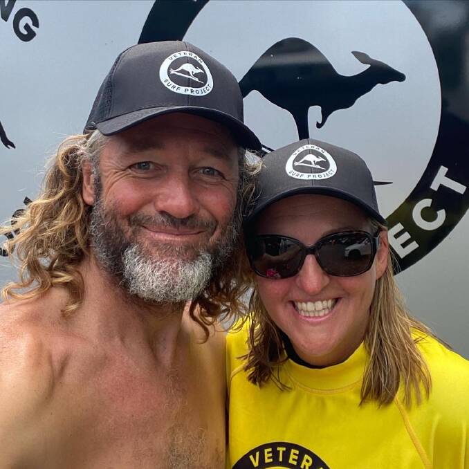 Veterans Surf Project instructor Rusty Moran and participant Angela Cooke. Image supplied.