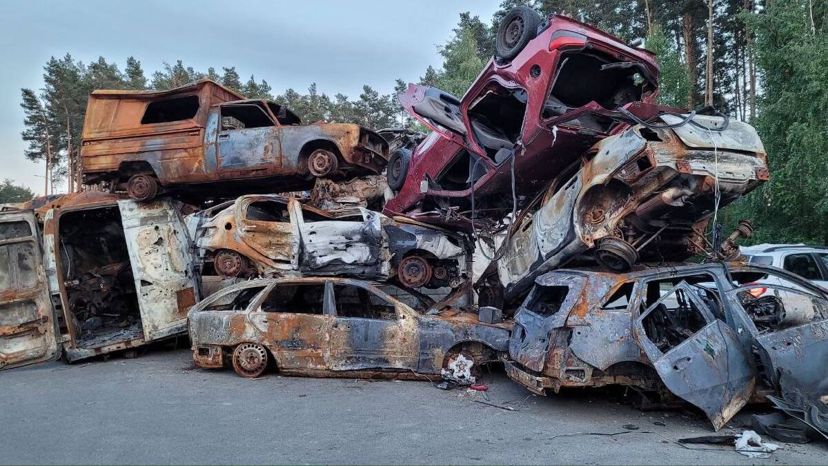 Civilian vehicles destroyed in Irpin. Picture supplied. Civilian vehicles destroyed in Irpin. Picture supplied.