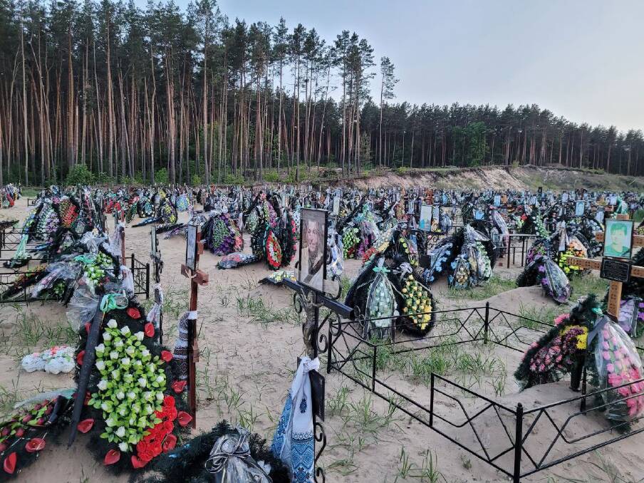 One of the more tragic scenes AK has seen, graves near Irpin. Picture supplied. One of the more tragic scenes AK has seen, graves near Irpin. Picture supplied.