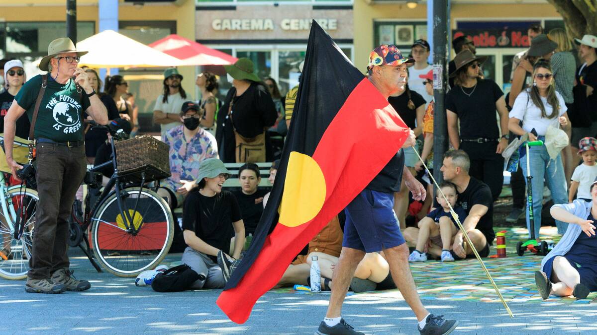 Hundreds march from Garema Place to the Aboriginal Tent Embassy for Canberra's Sovereignty Day protest. Pictures by Keegan Carroll