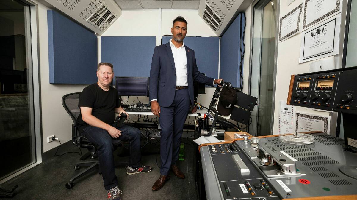 Australian Institute of Aboriginal and Torres Strait Islander Studies audio digitisation technician David Kilroy and deputy chief information officer Syed Jaffary in a studio used for digitising audio. Picture by Sitthixay Ditthavong