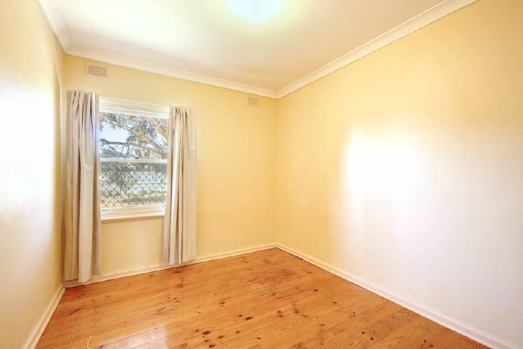 The home needs updating throughout but includes features such as timber floorboards. Picture supplied
