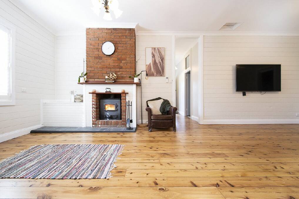 Original features include timber floorboards and a cast iron fireplace. Picture supplied